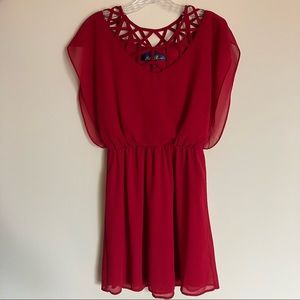 Francesca’s red lattice neck dress